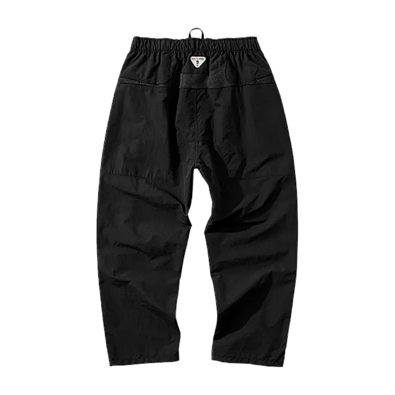 Relaxed fit technical pant with mesh inset